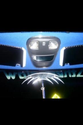 The dome lights, outside temp, and sunroof controls.