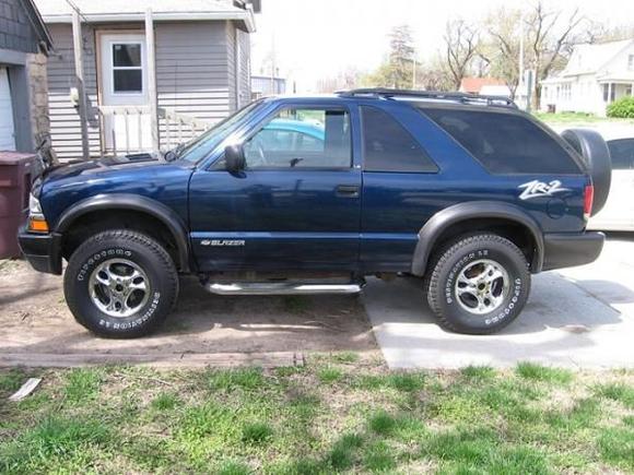 The Z (before lift, and brush guard). Horribly saggy in the back but it looks ten times better with it lift.