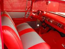 Lush red interior.  Lots of performance mods, but she's still a 57 inside and out.