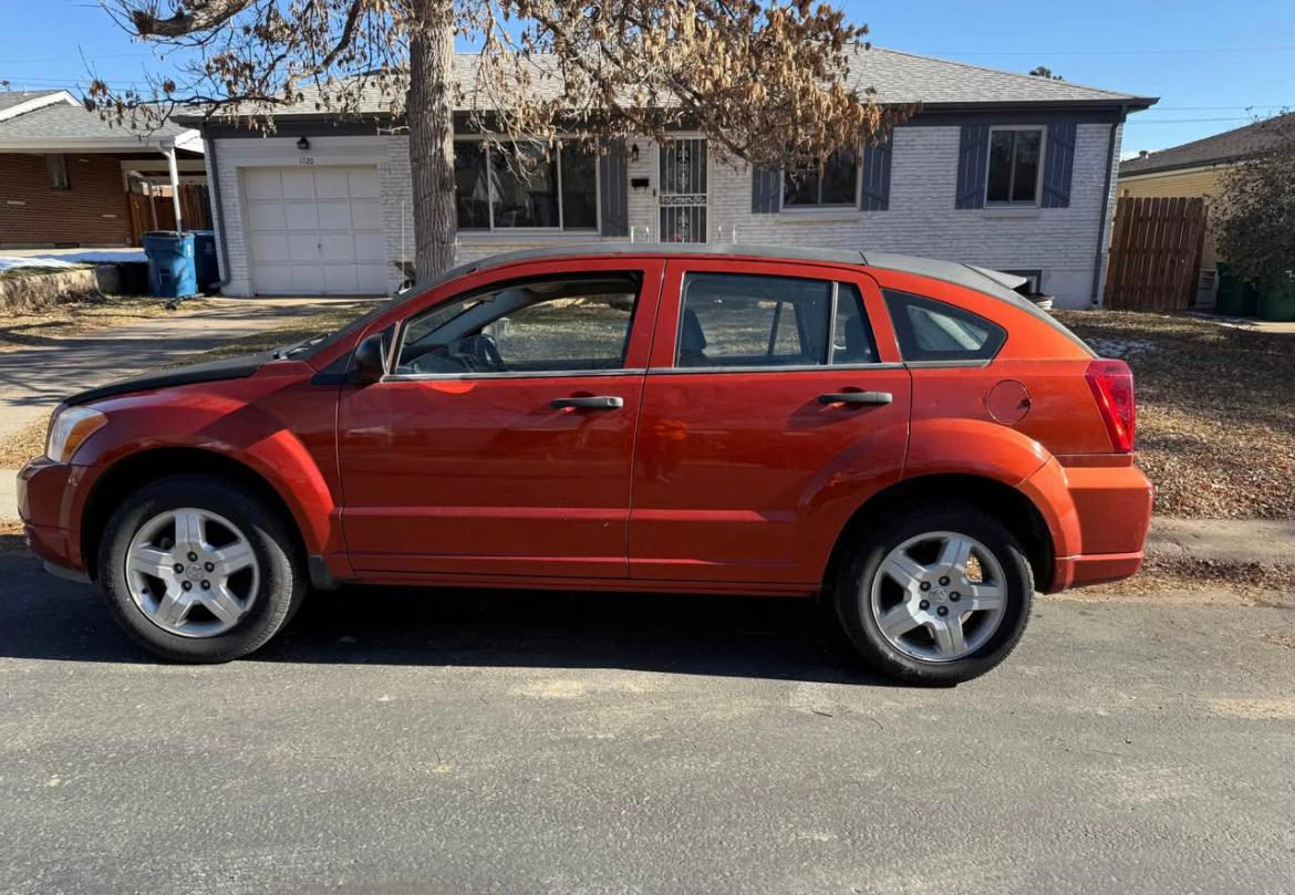 2008 Chevrolet Captiva Sport - 2008 Dodge Caliber · SE Sport Wagon 4D - Used - VIN 1B3HB28C58D747199 - 4 cyl - Manual - Red - Englewood, CO 80113, United States