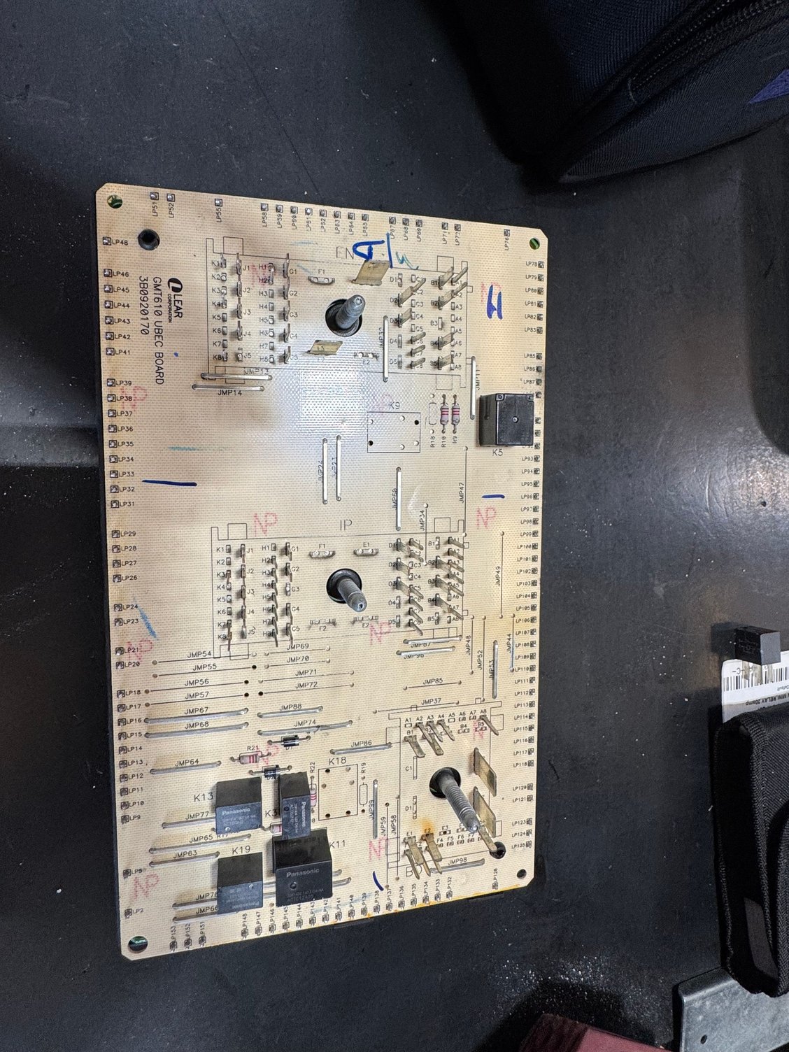 Back side of block , soldered in relays. one is for brake lights k5 I believe. 