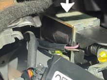 This is the smelly bugger! It's attached to the steering column.