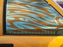 Hand design custom tint on the side windows and the back.