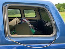 Targa (by Glasstite) topper on 1997 Chevy Silverado Ext. Cab and 6.6ft. bed with missing back left tinted window.