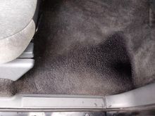 The puddle in the passenger side floor