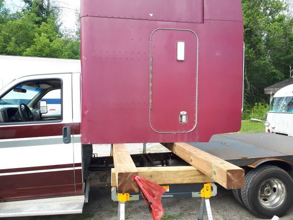 Backed up the truck and lined up the sleeper box. 
Now it is time to lower the box and test fit it. 
