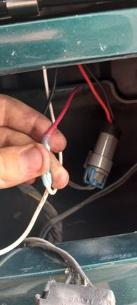 This is that same Red wire, we are currently looking through where the drivers side blinker would normally be (I took these pictures once I had the grill back on, but it is easier to do with the grill off, which you will already have done after installing the new headlights.