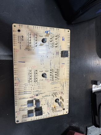 Back side of block , soldered in relays. one is for brake lights k5 I believe. 