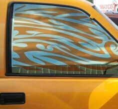 Hand design custom tint on the side windows and the back.