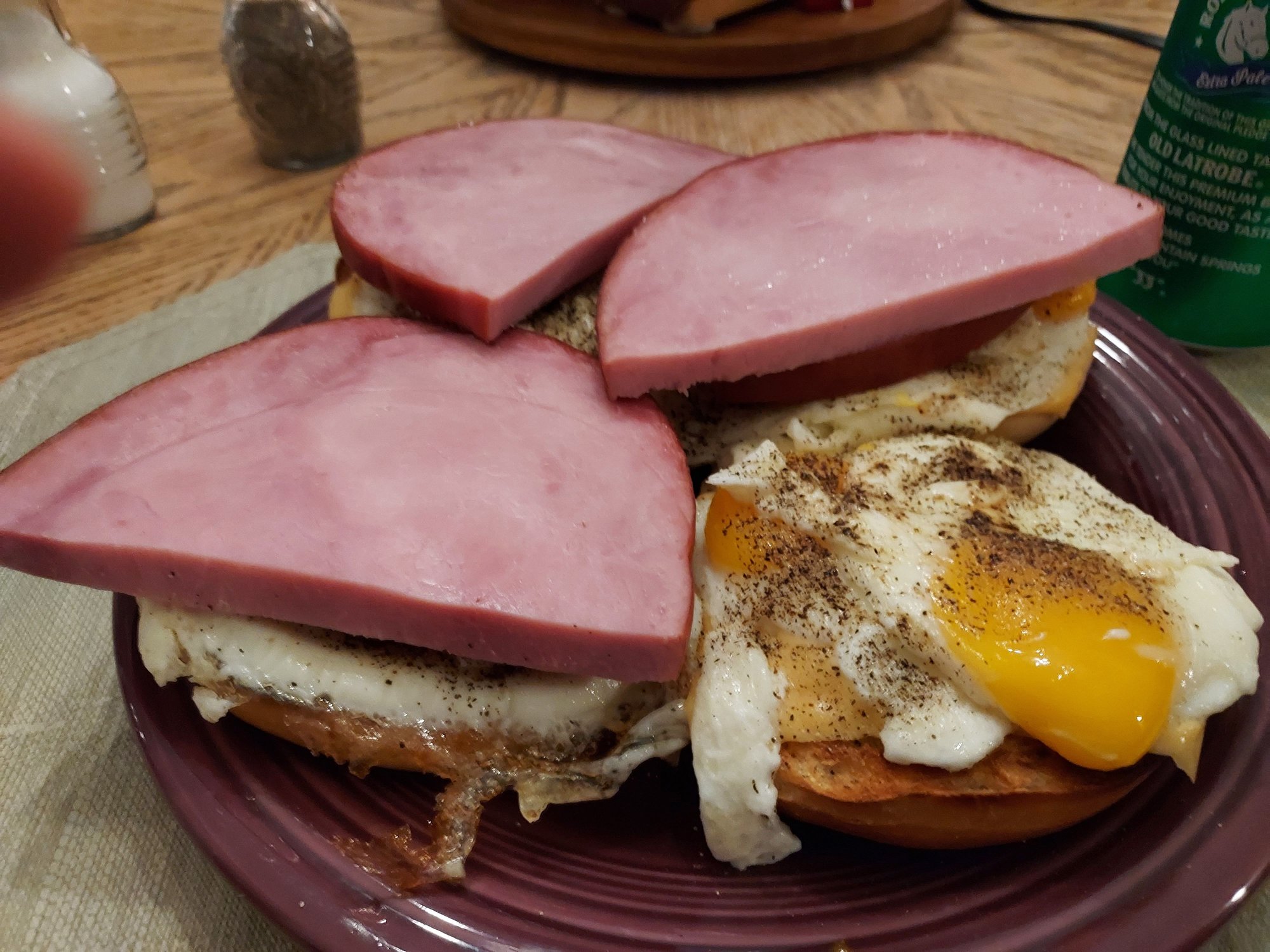 Dinner - Two Bagels, split and toasted.  Slice of American Cheese, two eggs sunny side up, and slab of ham steak on each Bagel half.  I'm just a little stuffed!  Yum!  😋 