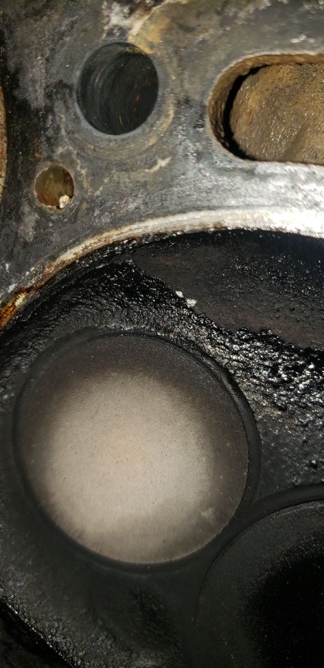 See here the carbon is building up right in the seat. So this is just going to be as close to stock build. Are you saying its not necessary to plane the bottom of the head? Because if not than I won't. Yes they were the factory steel gaskets, they weren't in terrible shape either. Also I tried to see if I could fit the thinnest feeler guage past the rings and I could not. 