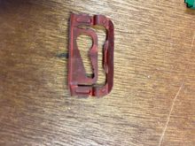 Red “adjustable depth” clip. Used in front glass. AMK part number B-10894