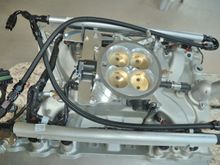 Fuel hoses arranged to back of engine