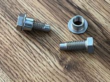 These are the new pivot bolts for the floating bow.  The bushing is threaded and screws onto the bolt.  There also is an unthreaded portion at the end of the bolt.