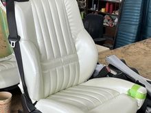 This front seats are from a 2001 BMW M3 convertible.  I had the upholstery shop recover them with Pearl White vinyl in the spirit of the factory buckets. There are a few wrinkles to be smoothed out.