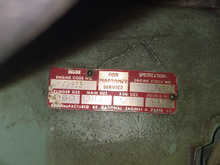 This plate is on the block, indicating a remanufactured engine.  I can't find any info about this company or the engine.