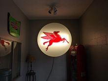 Pegasus. I scored two of these and relamped them and put one at each shop. The wife says it's still too bright so she only turns on one of the banks of lights. The original lights were those HO things and you would get a sunburn from them if you were in close proximity. I did keep all of the hardware, ballasts and bulbs.