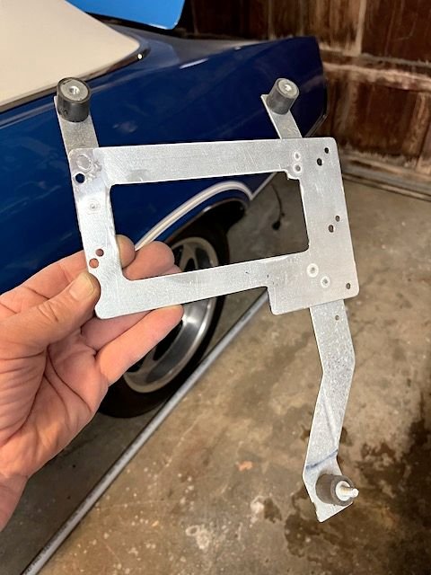 I fabricated this bracket from 16 ga metal construction plates you can buy at Home Depot.
