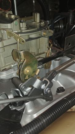 Assemble your bell crank linkage with the servo rod. Then bolt it down and pull on the rod to verify full travel of the throttle and no interference's. 