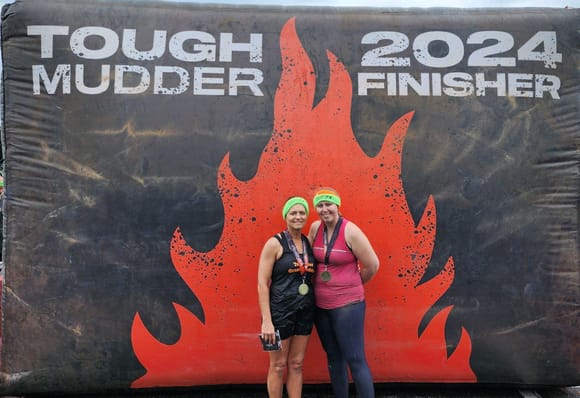 9.3 miles, 25 obstacles, completed in 5-hours.  Those gals are definitely Tough Mudders!  Very proud of them both!