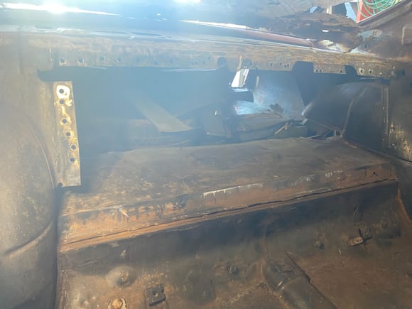 Removed the divider behind the rear seat to clean and get to the spot welds for removing the old floor. 