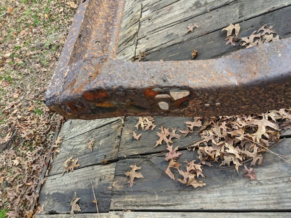 This is the only rust spot I found.. behind the bumper bracket.