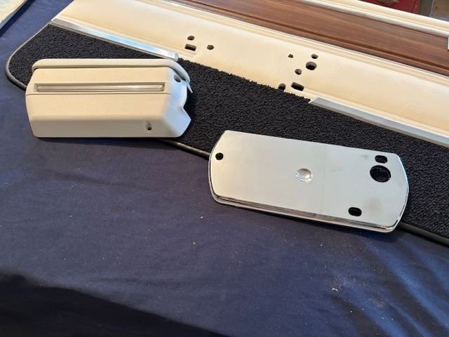 New plastic chrome armrest plate and new armrest and pad.  May have to return them.  Pad does not fit well.