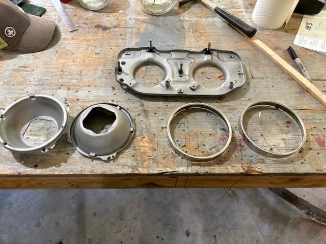 Sand blasted it all, except trim rings.  Lacquer thinner to remove previous red overspray and then ammonia based metal polish.  They cleaned up well