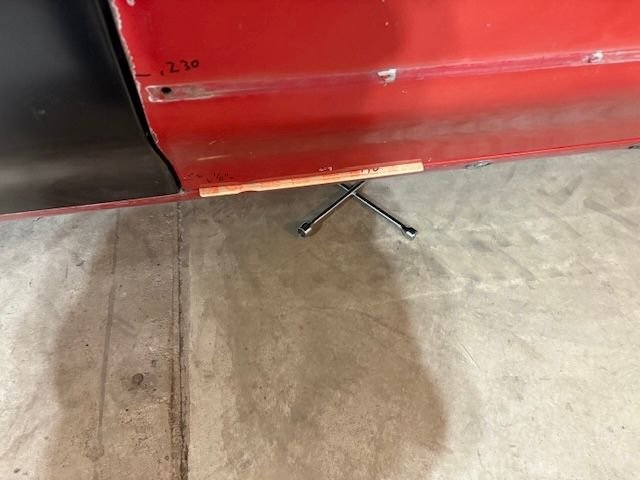 Stick is way lose now under the door.