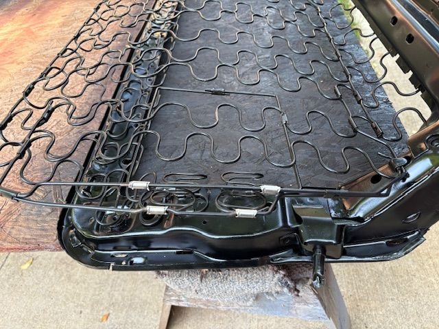 New, installed.  Small soft steel wrap around sleeves are used as attachments.  Getting these springs in place went pretty well.