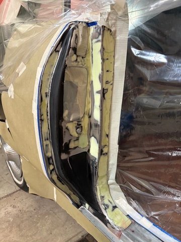 Latch area.  This has a new Quarter Panel.  Original Sheetmetal had perhaps 50 spot welds that showed through the paint.  I did some filler work to make this better than what the factory kicked out the door.