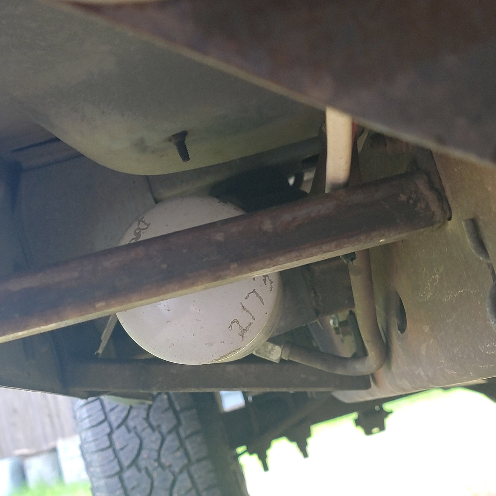 This the engine oil filter, wanted it away from the exhaust manifold. I would bolt a skid plate to these braces, they were easy to bolt in where the frame is a channel. Where the frame is boxed is where I would weld or use nut serts. I guess I should take some pictures of the routing and the fittings. Thats 1/2in .049 tubing and JIC 37 deg hydraulic fittings and maybe the tools I used in various spots.