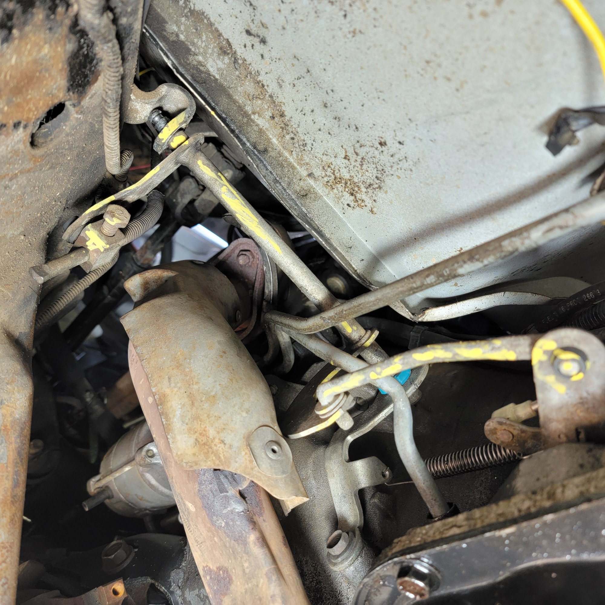 This where its supposed to fit. The yellow on the right is the tranny shift lever.