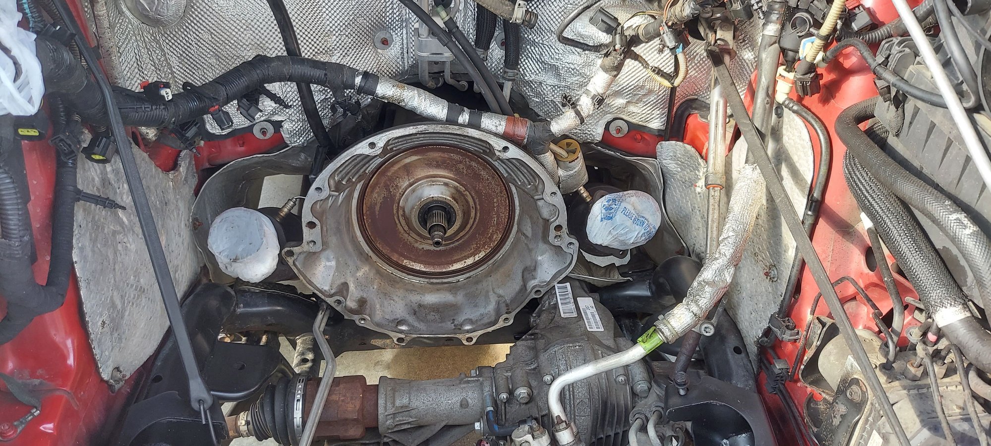 The torque converter output seals were not leaking but having that water in there rusted it up.