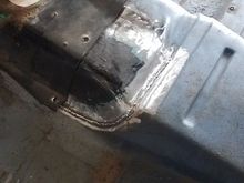 The trans tunnel repair. Still need some clean up, sealant and primer.