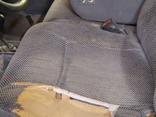 BEFORE: regular cab seat. The cushion is South Park Trapper Keeper level integrated with the frame