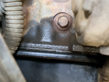 Lower portion is the oil pan, upper is the block, also what’s up with this hole above the seeping plug?