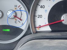 Before engine temperature goes over second mark.  Cruise and overdrive still work