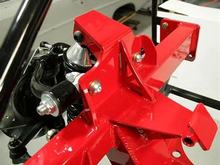 This style uses the factory style mounting rod (I forget the name) to bolt to a slotted fixture. It is mounted vertically. 