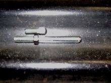 The rod it came with and the one I made. The size difference is crazy. That would have never worked. 
