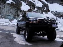 My big black truck. Lifted. 37" mud terrains. Brush bar. 4 maxtel daylighters. warn XD9000 winch. remote start. tow package. side steps