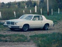 1977 Olds Cutlass Supreme. picture taken 1985. 305 2bbl auto. white leather interior with bucket seats, airplane style center console shifter (not the hurst one, too bad). swapped the dome and carb over to a 4bbl. BF Goodrich radial TA's, 70's front and 60's rear. factory GM rally wheels.
ended up smashing it twice in the same weekend on a camping trip.