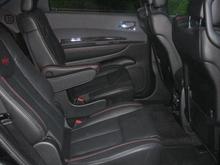 View of captains chairs from rear passenger door.