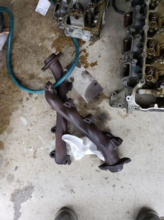 Manifolds cleaned up and ready to go on the new heads...old heads next to them will most likely be rehab'ed for my '01 Durango.