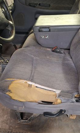 BEFORE: regular cab seat. The cushion is South Park Trapper Keeper level integrated with the frame