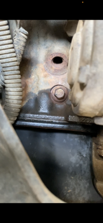 Lower portion is the oil pan, upper is the block, also what’s up with this hole above the seeping plug?