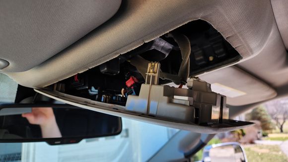 Console unsnapped from headliner