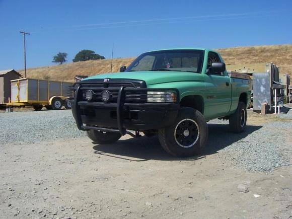 Eagle off-road alloy wheels, K&amp;N cold air intake, Flowmaster 40 series muffler, Waag brush guard, and Warn Lights