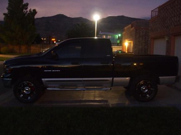 painted calipers, leveled, new steps, 33X12.5X20 terra grapplers!  Not bad truck for 6K!