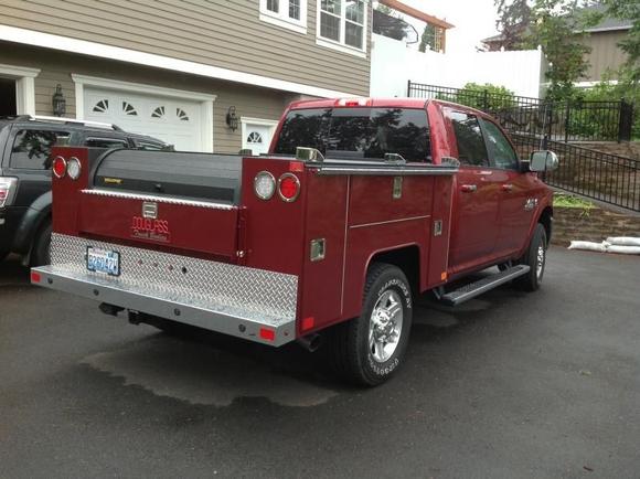 Custom chrome bars located along top - outside of boxes lock in the down position to provide additional security.